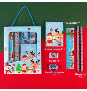 Close-up of 6-piece Christmas stationery set with ruler, notepad, pencils, and sharpener