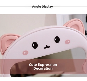 Detail of pink makeup mirror with 3D bear ear decoration and cute animal face printing