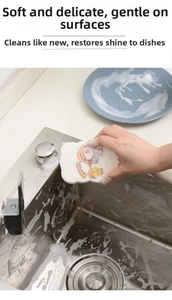 Cartoon bread shaped compressed wood pulp sponge creating rich foam in kitchen sink