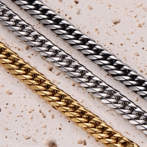 Polished 18k gold silver and black stainless steel cuban link chains in three colors