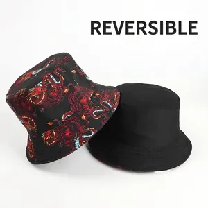 Cappello a secchiello reversibile con stampa drago rosso e lato in cotone nero semplice