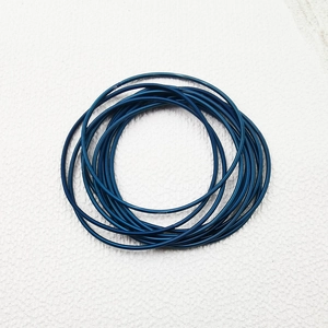 Detailed macro view of royal blue spring-style 1.7mm stainless steel wire bracelets