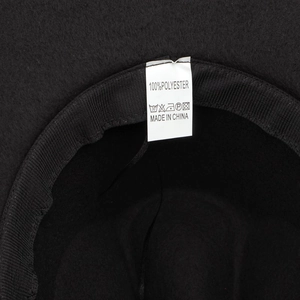 Interior detail of a black 100% polyester jazz hat showing care label and sweatband