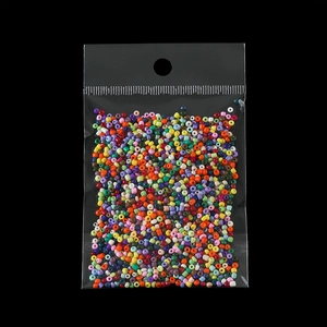 Detail of multi-color glass seed beads in a self-sealing laser bag with hanging hole