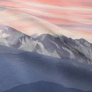 Detail shot of woven fabric texture with layered mountain landscape art print