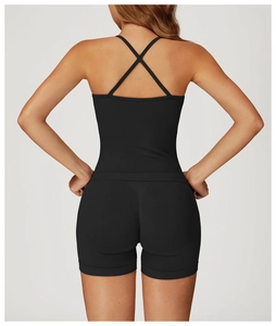 Close-up of the strappy criss-cross back design on a black seamless yoga sports bra