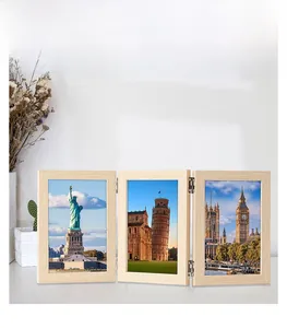 Detailed close-up of a triple folding light wood photo frame with durable metal hinges