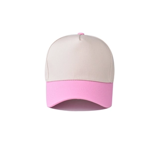 Detail of a two-tone cotton baseball cap featuring a beige crown and bright pink brim