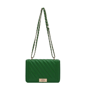 Elegant green quilted chain bag with gold square lock and minimalist white background
