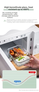 Three-compartment heat-resistant glass lunch box being taken out of a microwave oven