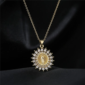 Classic Virgin Mary necklace with cubic zirconia on black silk background