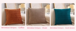Detailed view of crushed velvet textured throw pillows in brown, khaki, and dark green colors