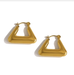 Detailed view of 18K gold plated stainless steel geometric triangle earrings with high polish