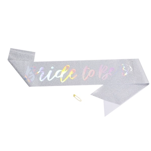 Glittery silver Bride to Be sash with holographic lettering and gold safety pin detail