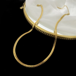 Flat herringbone snake chain necklace in gold finish with adjustable extender chain
