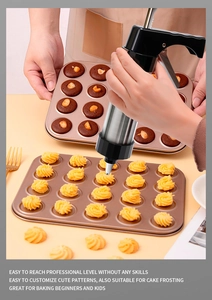 Action shot of using stainless steel cookie press gun for baking patterned biscuits