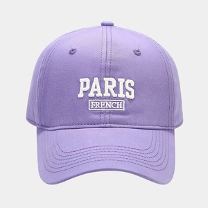 Close-up of lavender cotton baseball cap with white 3D PARIS embroidery detail