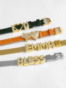 Detail of Milanese mesh bands and leather straps with zircon letter charms and heart slides
