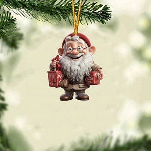 Close-up of a 3D cartoon gnome ornament with red gift boxes hanging on a pine tree