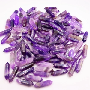 Bulk purple amethyst quartz crystal hexagonal points with natural gemstone textures