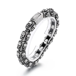 Retro silver skull steel bracelet for men with gothic multi-link embossed design