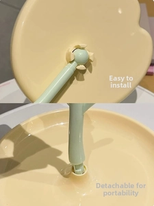 Detail of detachable beige base and green support joint for tulip desk makeup mirror
