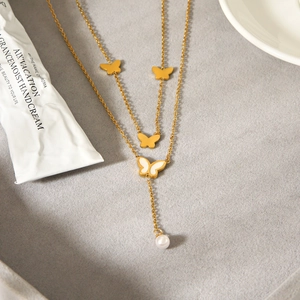 Double layer 18K gold stainless steel necklace with butterfly charms and pearl pendant