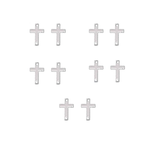 Macro shot of 10 silver metal vintage cross charms with dual holes for DIY jewelry making