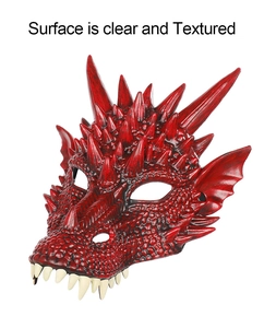 Detailed close-up of a red dragon cosplay mask showing realistic scale textures and fangs