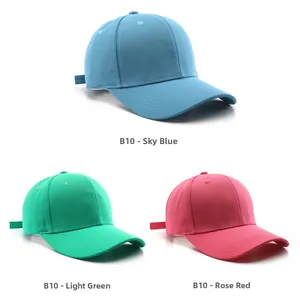 Close-up of classic six-panel twill cotton baseball caps in blue, green, and rose red