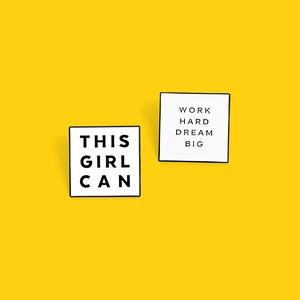Square enamel pins with This Girl Can and Work Hard Dream Big text on yellow background
