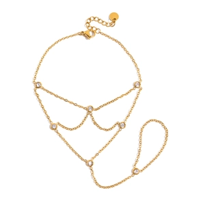Elegant gold slave bracelet with sparkling zircons and delicate chain for women