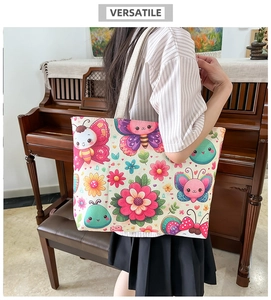 Close-up of bohemian canvas tote bag featuring colorful cartoon butterfly and floral prints