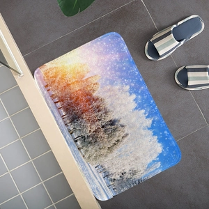 Detailed top-down view of winter snow forest printed absorbent flannel floor mat on tiles