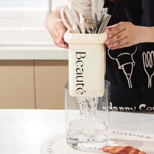 Cream-colored aesthetic utensil holder with draining function for spoons and forks