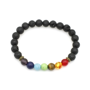 Detailed close-up of 8mm lava rock beads and seven colorful chakra stones on the bracelet