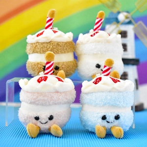 Four colorful mini cake-shaped plush pendant dolls with strawberry candle decoration
