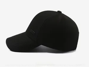 Side view of structured black baseball cap with 6-panel design and rectangular logo patch