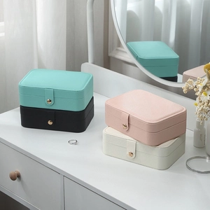 Portable PU leather jewelry organizer in four colors with gold button closure for travel