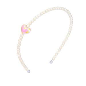 Handmade white pearl headband for girls featuring a pink heart charm with yellow dots