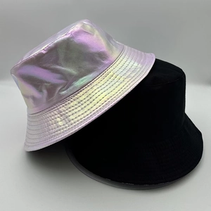 Detail showing laser iridescent and classic black bucket hats with wide brim design