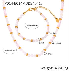 Detail of pink sea shell beads necklace and bracelet set with golden spacers and clasp