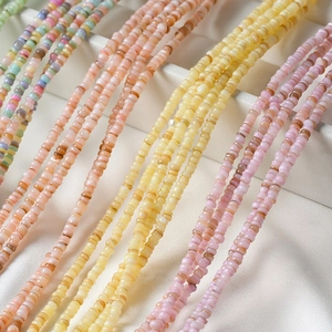 Macro shot of 2mm macaron seed beads in pastel colors for DIY jewelry making