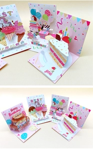 Detailed 3D pop-up birthday card featuring a pink unicorn ice cream and cake design