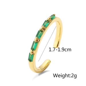 Detailed view of gold plated ring with green zircon stone showing 1.7-1.9cm inner diameter