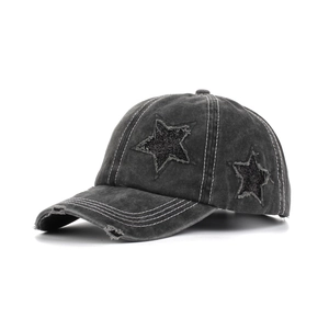 Washed dark grey baseball cap with vintage distressed details and sequin star patch