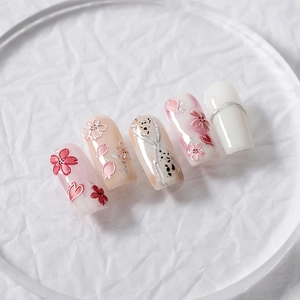 5D stereoscopic cherry blossom press-on nails with pink 3D floral relief and petal gradients