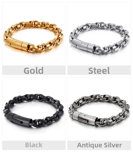 Detail of chunky chain bracelets in gold, steel, black, and antique silver finishes