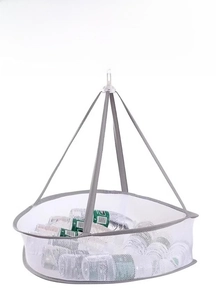 Single-layer drying net with white mesh and grey trim showing strong weight capacity