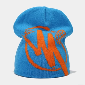 Close-up of sky blue knitted beanie with orange abstract pattern and textured knit